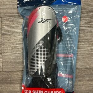Reebok Silver and Pink Shin Guards size M/L